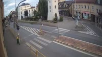 A square with a fountain, streets