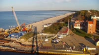 Beach, harbor, lighthouse