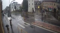 A square with a fountain, streets